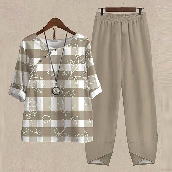 Full shot of the women's floral lounge set: soft top & relaxed harem trousers for ultimate casual comfort.
