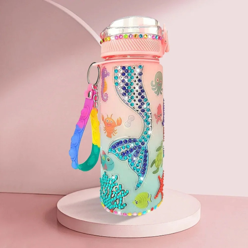 DIY glow-in-the-dark water bottle craft kit for kids. Customize and personalize for unique hydration & art fun.