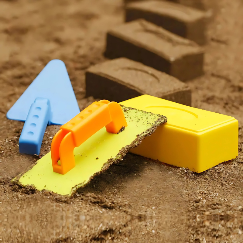 Preschool kids enjoying outdoor fun with sand and snow building blocks. Creative construction activity set.