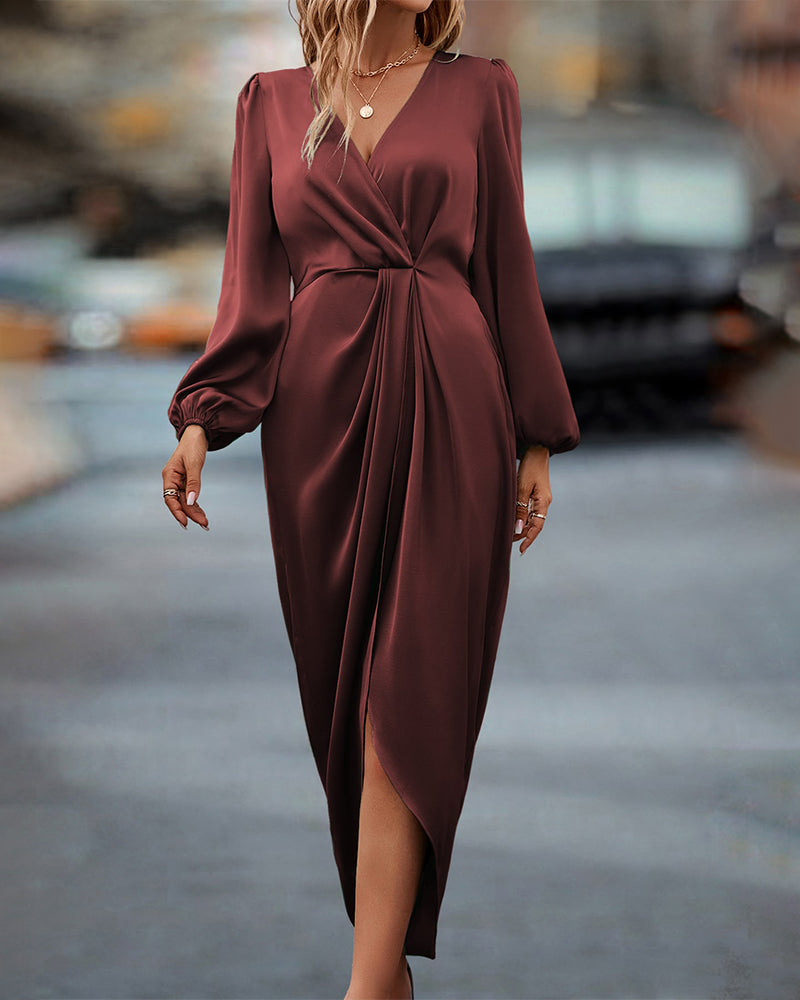 Beige V-neck women's midi dress, showcasing elegant long lantern sleeves and a comfortable A-line cut. Perfect for chic wear.