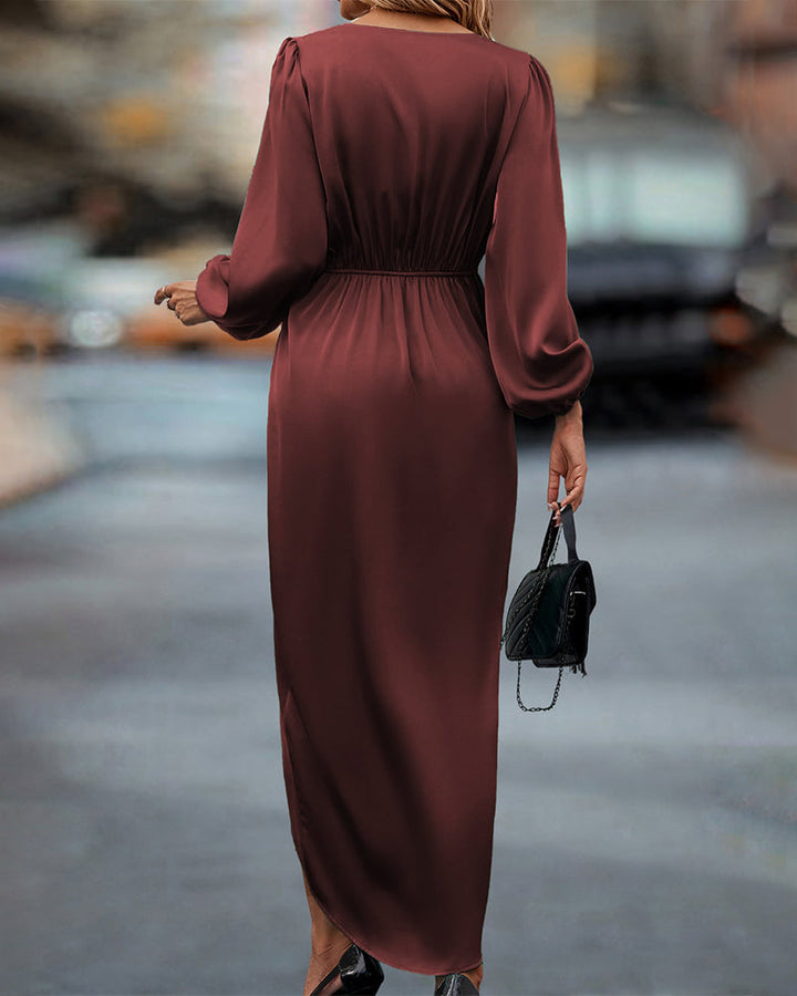 Chic women's midi dress with a flattering V-neckline & elegant long lantern sleeves; versatile A-line design.