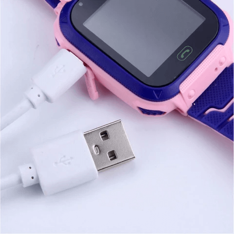 Child's hand wearing a green SafeScout smartwatch, highlighting its comfortable and secure fit.