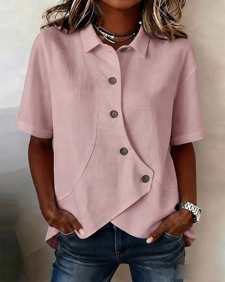 Elegant women's asymmetrical long sleeve blouse, a fashionable button-down top for modern women.