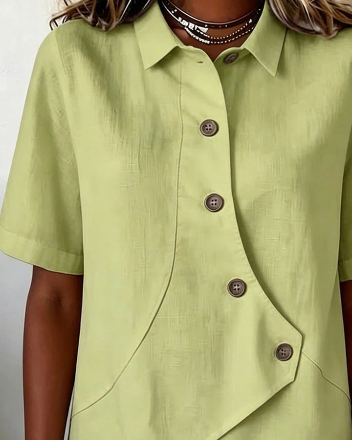 Versatile women's long sleeve blouse; stylish asymmetrical placket design for various occasions.