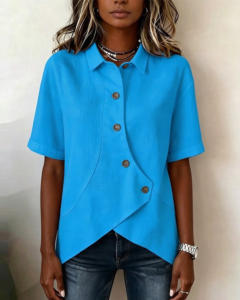 Women's smart casual button-down blouse with a unique asymmetrical placket and long sleeves.