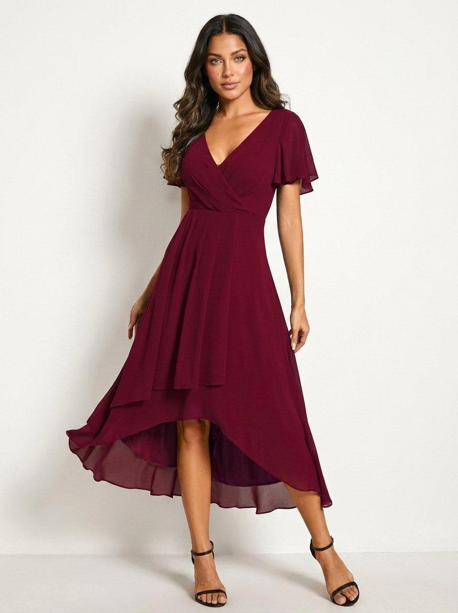Red elegant women's midi dress with delicate embellishments, a stunning choice for formal parties.