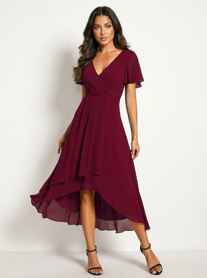 Red elegant women's midi dress with delicate embellishments, a stunning choice for formal parties.