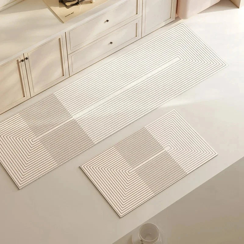 Cushioned anti-fatigue kitchen mat, non-slip & absorbent, perfect for prolonged standing in kitchen decor.