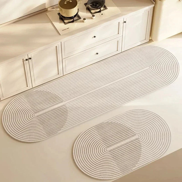 Absorbent non-slip kitchen mat with anti-fatigue cushioning, ideal for kitchen standing areas & decor.