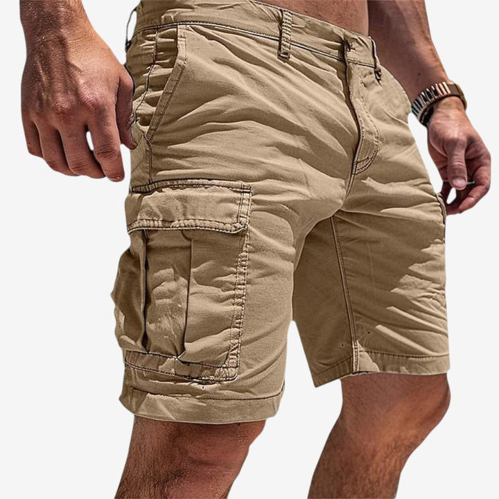 Comfortable knee-length men's shorts with practical multi-pockets, great for daily wear and relaxed style.
