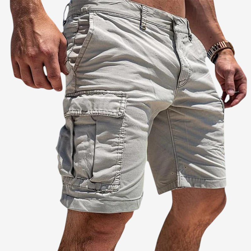 Versatile men's summer shorts, knee-length with multi-pockets. Essential casual wear for warm weather comfort.