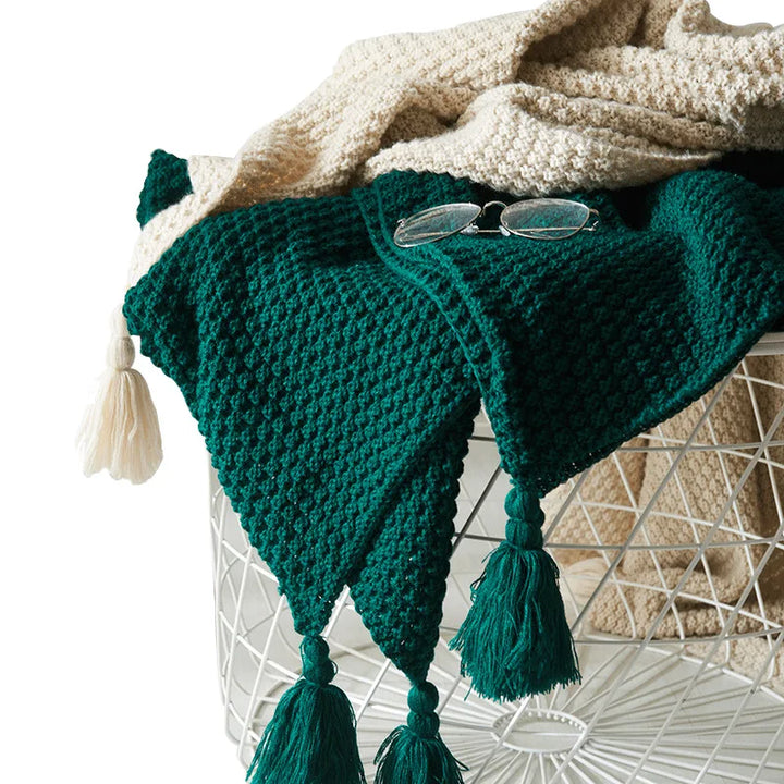 Soft wool throw, knitted design, adds warmth & style to any home decor setting.