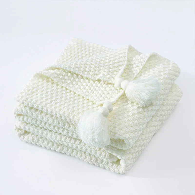 NordicCozy knitted wool throw, luxurious soft texture, enhances modern home decor.