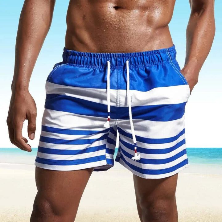 Stylish men's striped quick-dry beach shorts, perfect for vacation, poolside, and summer essentials.