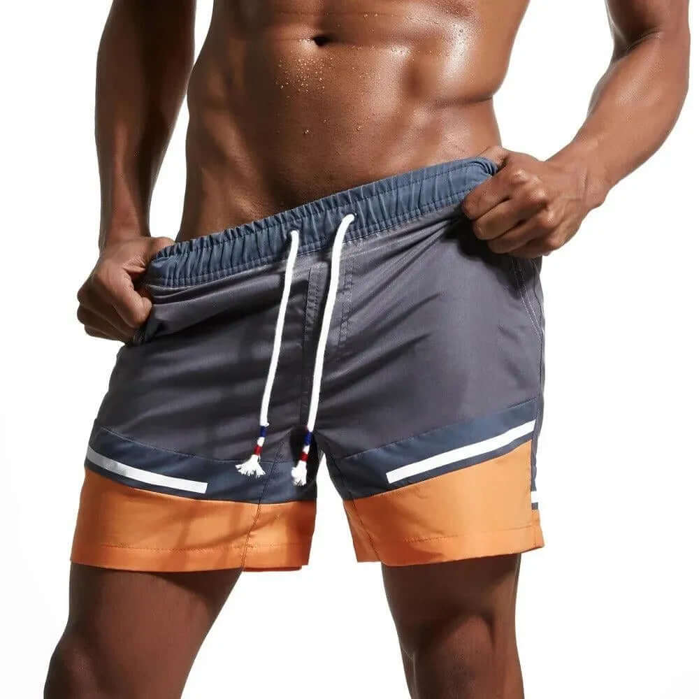 Classic striped men's quick-dry swimwear, designed for ultimate comfort and poolside style.