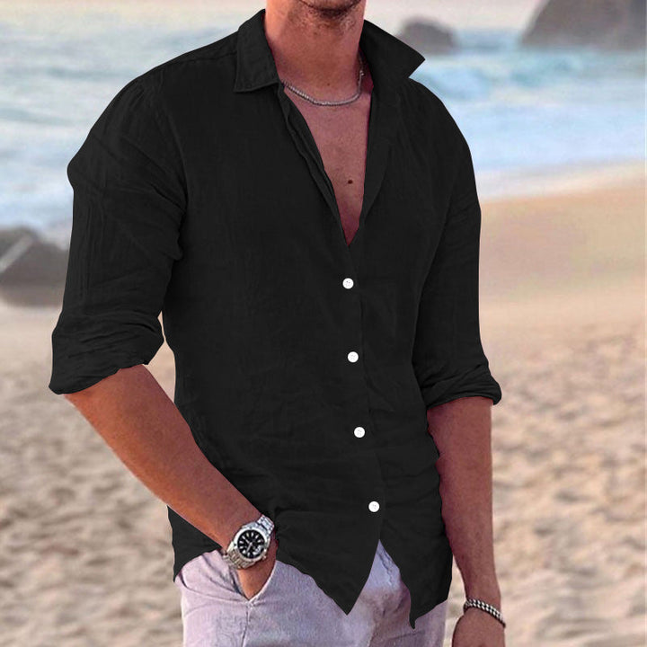 Durable men's relaxed fit long sleeve button-down casual shirt, combining style with comfort.