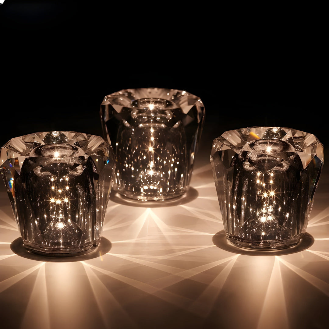 Crystal table lamp with diamond facets, rechargeable LED lighting, versatile decor piece.