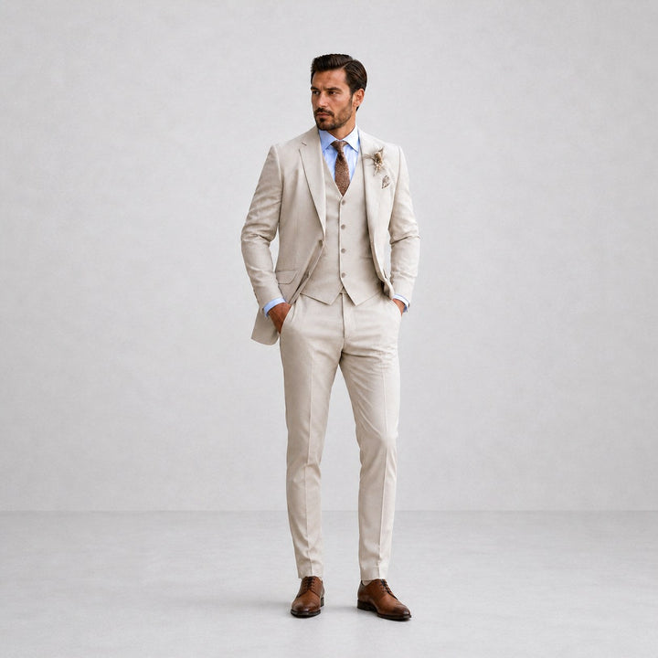 Elegant men's three-piece suit, ideal wedding attire with tailored blazer, waistcoat & trousers.