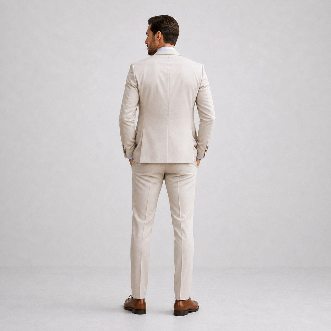 Stylish men's three-piece suit for smart casual or formal menswear fashion, featuring blazer, vest, trousers.