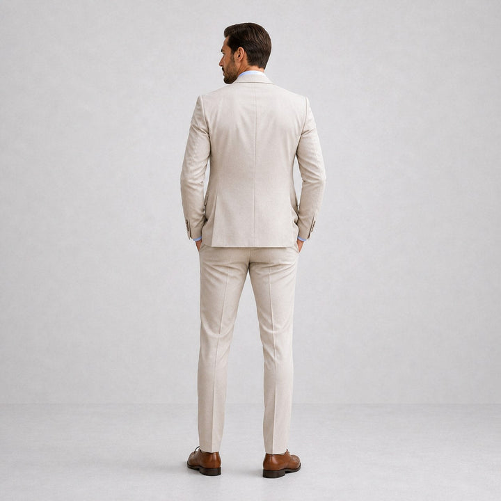 Stylish men's three-piece suit for smart casual or formal menswear fashion, featuring blazer, vest, trousers.