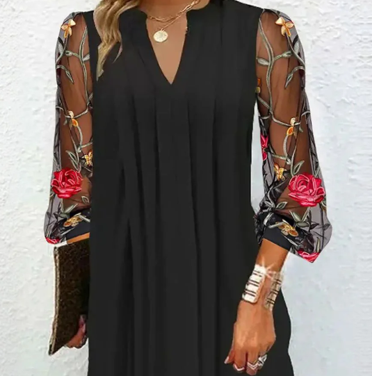 Sophisticated women's black V-neck dress with delicate floral sleeves, ideal for formal occasions & evening wear.