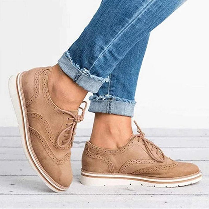 Women's stylish platform oxfords with lace-up detail. Comfortable and elegant formal or casual footwear.