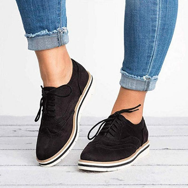 Versatile women's platform oxford shoes. Elegant lace-up design, perfect for stylish formal & casual looks.