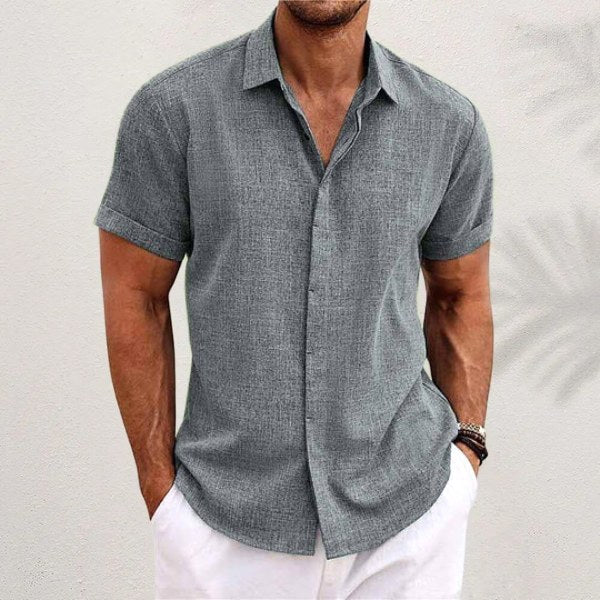 Black men's casual button-down shirt with a collar, versatile and relaxed fit for everyday wear.