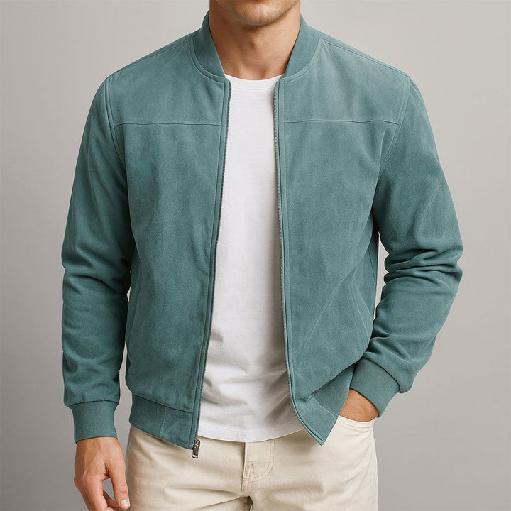 Close-up of men's sophisticated tailored blazer jacket fabric, showcasing quality and refined detail.