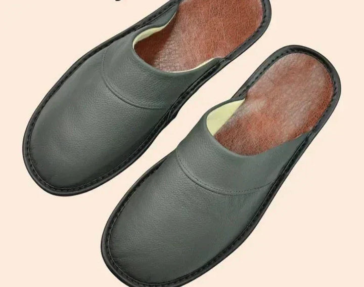 Stylish men's cosy slip-on house slippers for indoor comfort & support.