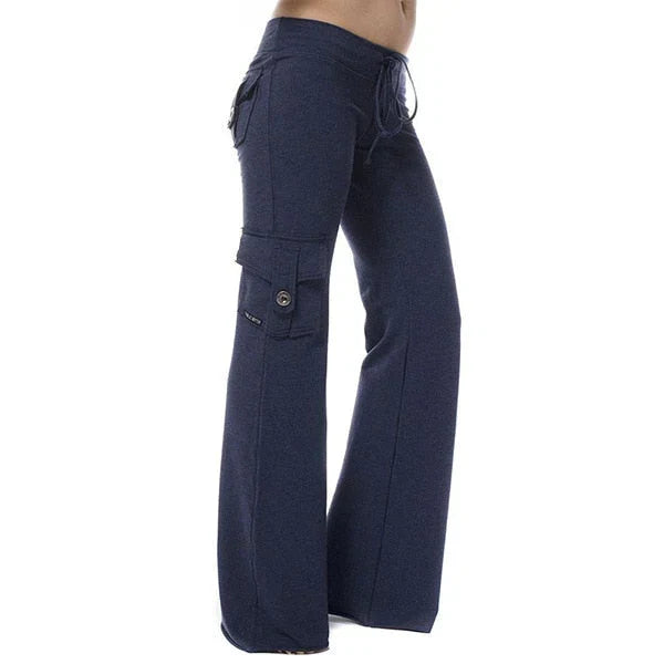 Close-up of durable women's bootcut cargo pants showing detailed pockets and quality fabric.