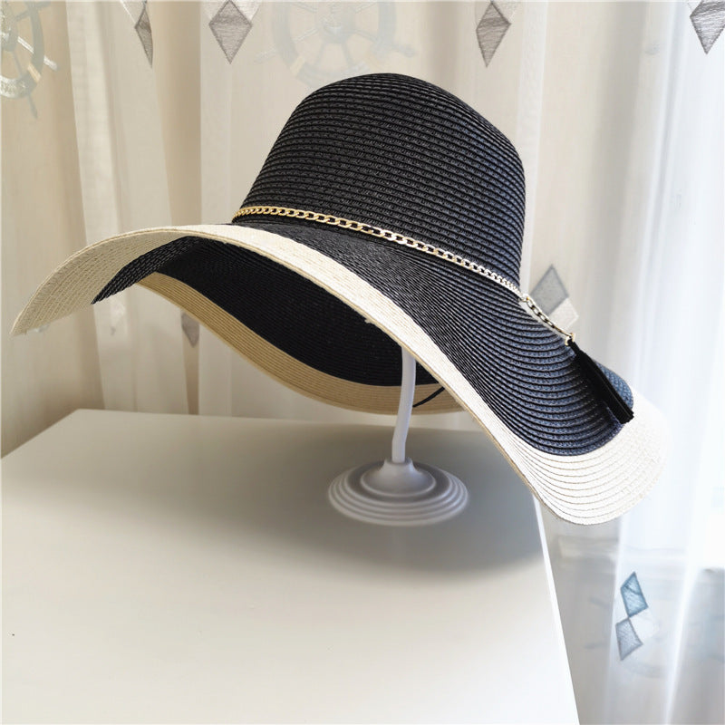 Stylish women's wide brim hat, offering excellent UV sun protection for beach days & travel.