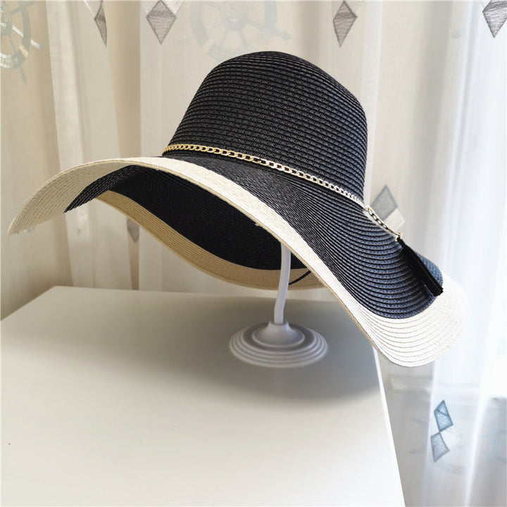 Stylish women's wide brim hat, offering excellent UV sun protection for beach days & travel.