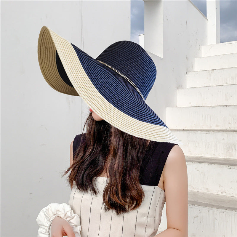 Women's Wide Brim Summer Hat with UV protection, perfect for beach & outdoor activities.