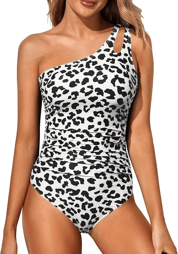Elegant women's one-shoulder swimsuit with tummy control, ideal for a chic poolside look.