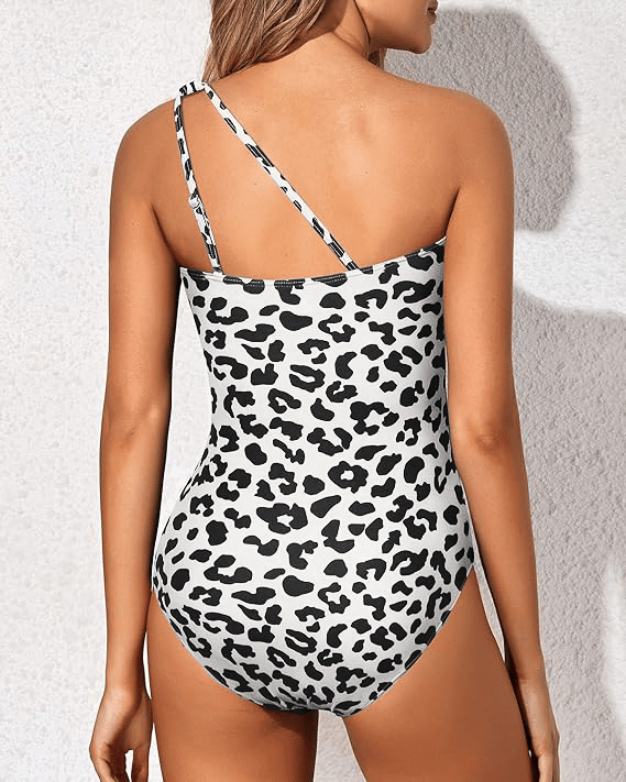 Stylish women's one-shoulder swimsuit. Tummy control design ensures a sleek, flattering beach look.