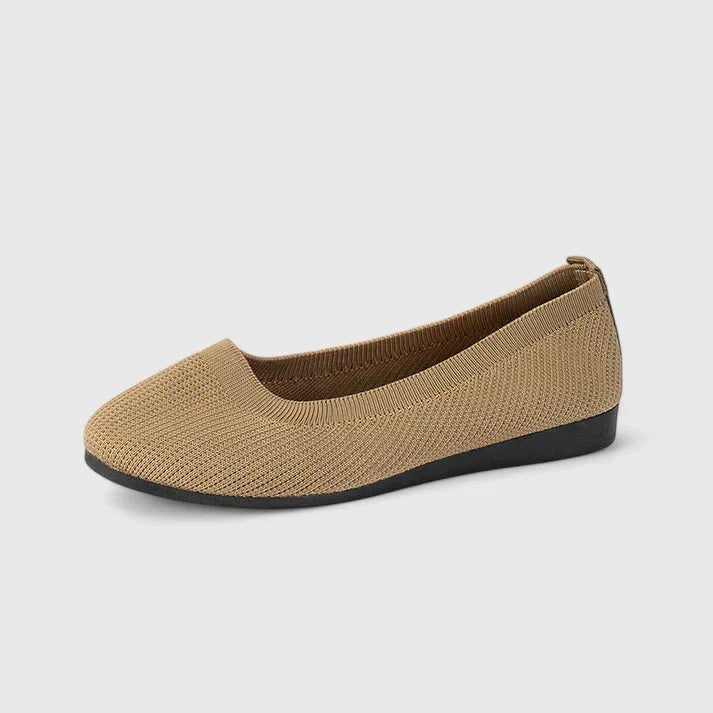 Easy slip-on women's flats, offering arch support & orthopedic comfort for walking & daily activities.