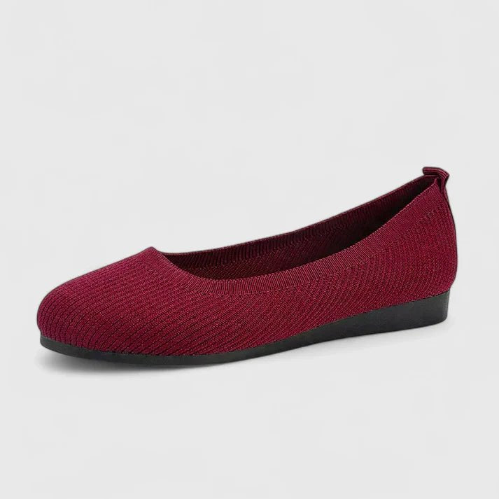 Elegant women's arch-support slip-on flats, designed for maximum comfort and ergonomic foot health.