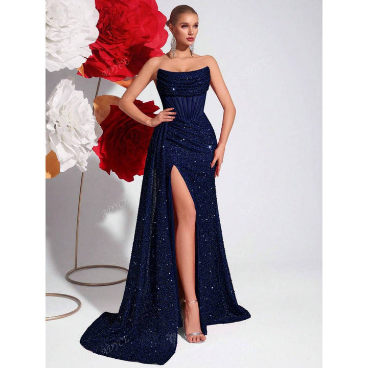 Fashion-forward women's sequin gown with a high slit & corset waist. Stand out at formal events.