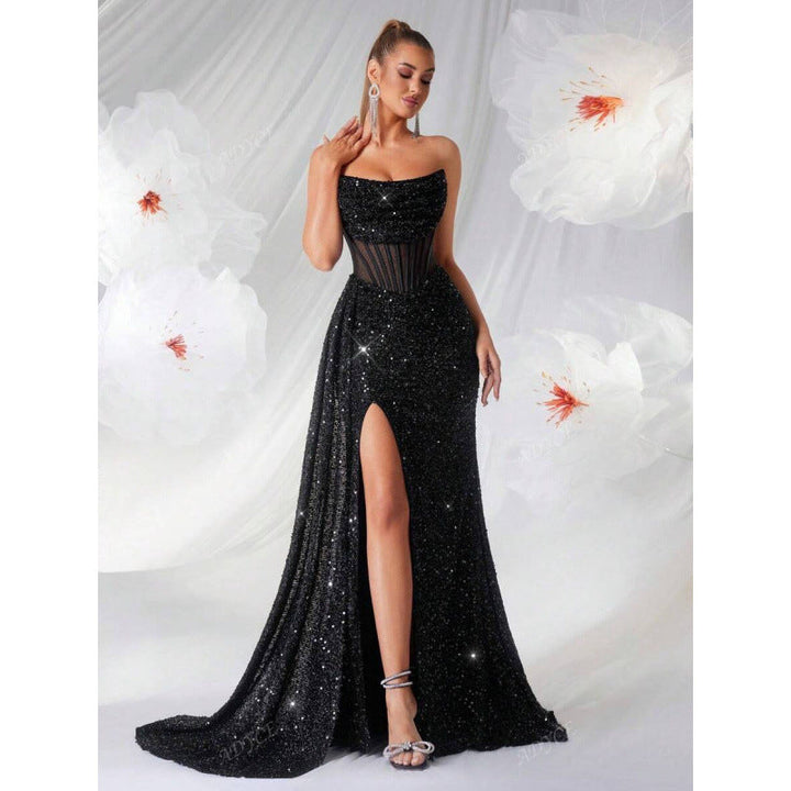 Intricate sequined women's evening gown. Boasts a high thigh slit and flattering corset bodice.