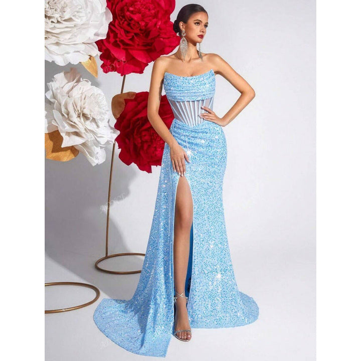 Glamorous sequin formal dress with a high slit & corset waist, perfect for special occasion evening wear.