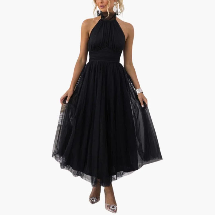 Elegant women's midi dress with a sophisticated halter neck, ideal for evening wear.