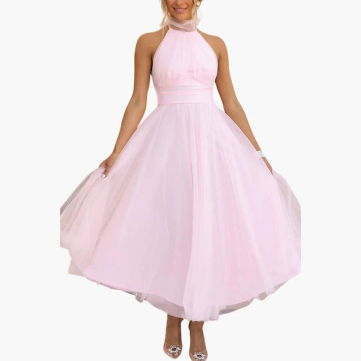 Close-up of the elegant halter neckline on a women's midi dress, perfect for events.