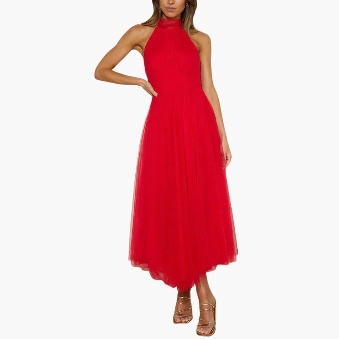 Side profile of a flowy women's midi dress, elegant and perfect for parties.
