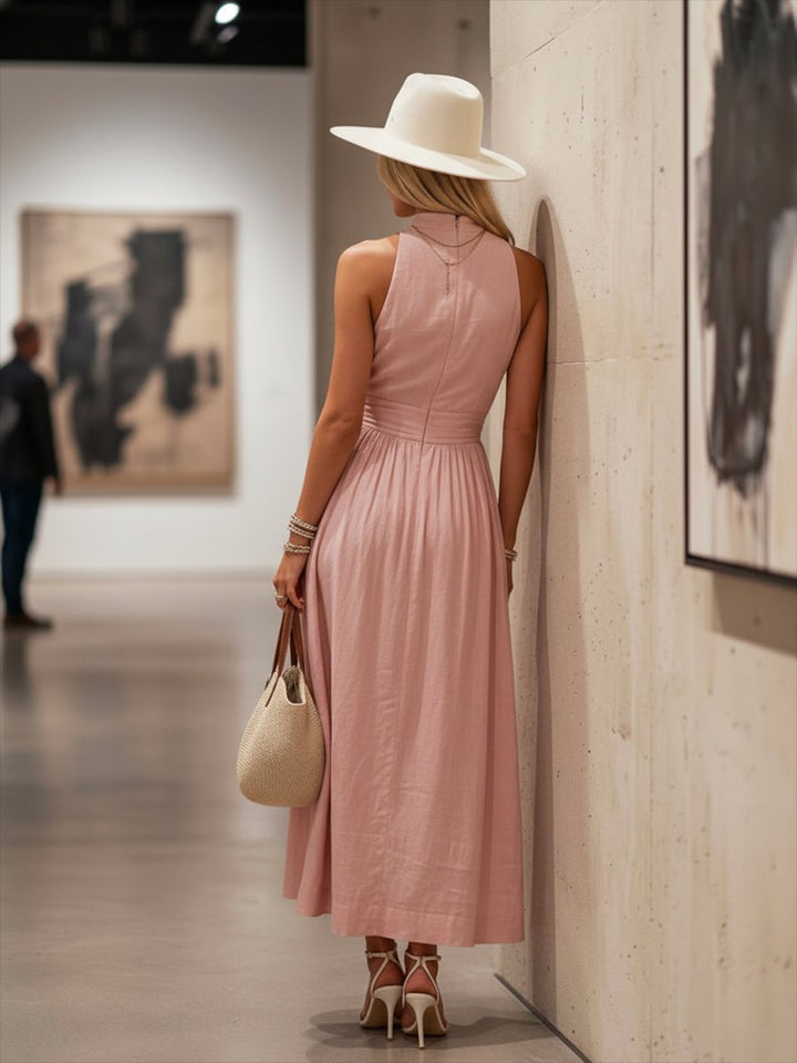 Women's party-ready ruched halter maxi dress, offering elegant comfort for chic summer fashion events.