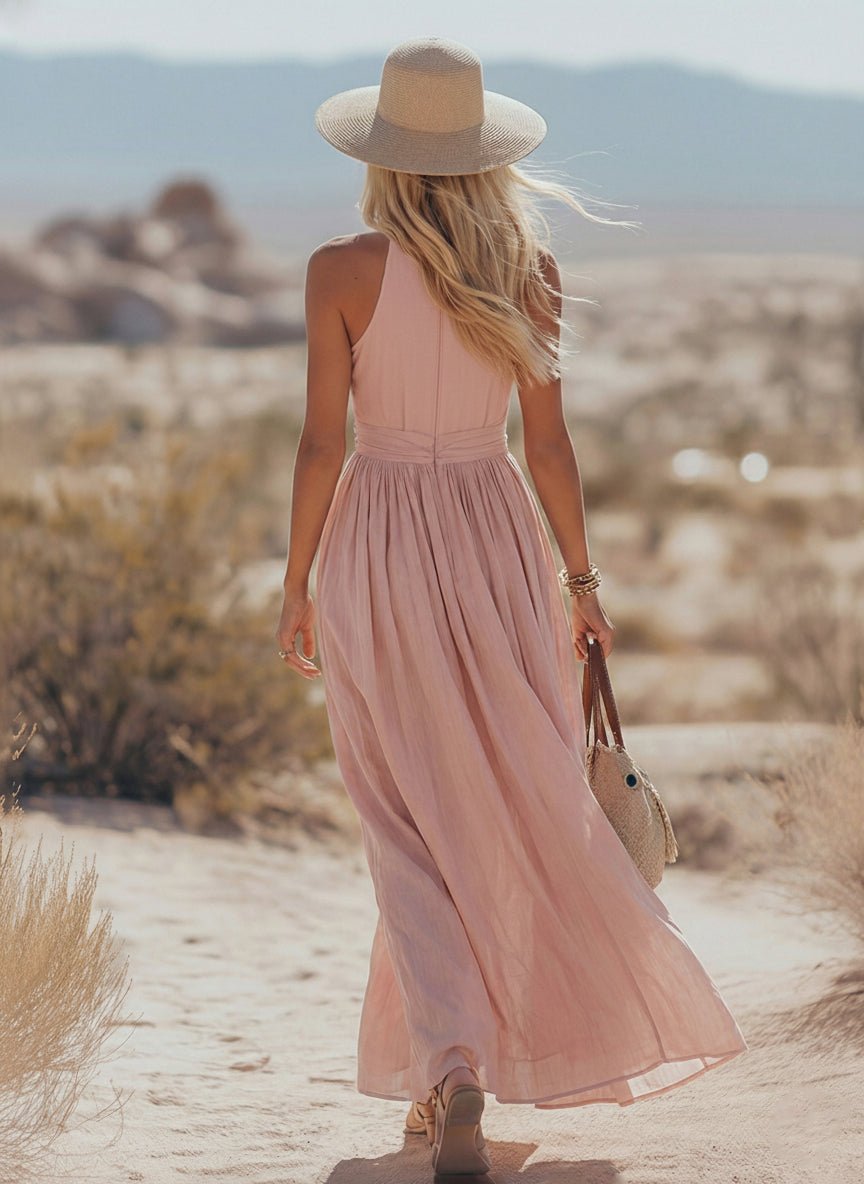 Sleeveless V-neck halter maxi dress for women, featuring elegant ruched styling for summer outfits.