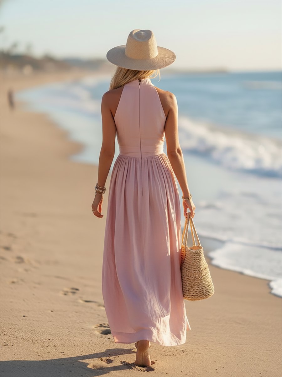 Stylish women's summer maxi dress, featuring a halter neck, ruched bodice, and elegant flowy design.