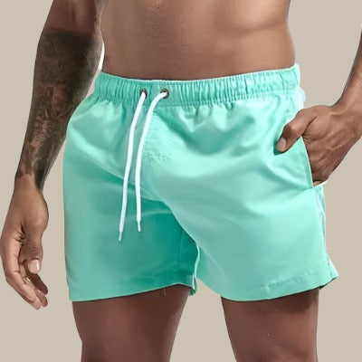 Comfortable men's quick-dry pool shorts. Essential beachwear and active swimwear for vacations.