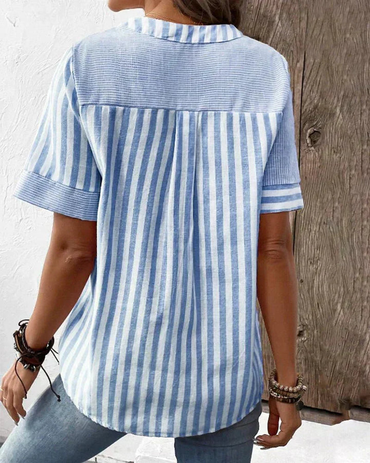 Versatile women's comfort wear: soft striped blouse, round neck, long sleeve for stylish everyday looks.