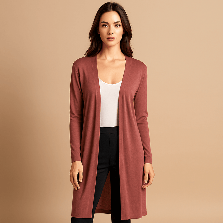 Comfortable women's long knitted cardigan sweater. Stylish outerwear for cozy winter fashion.